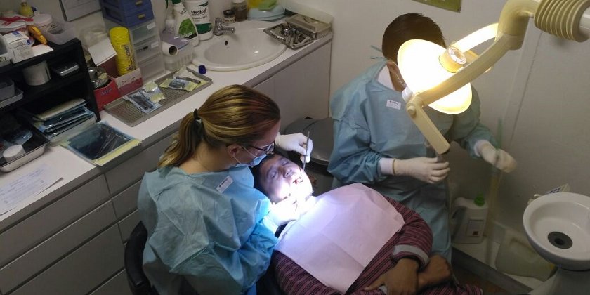 •	A migrant worker gets dental treatment in HealthServe’s dental clinic in Singapore.